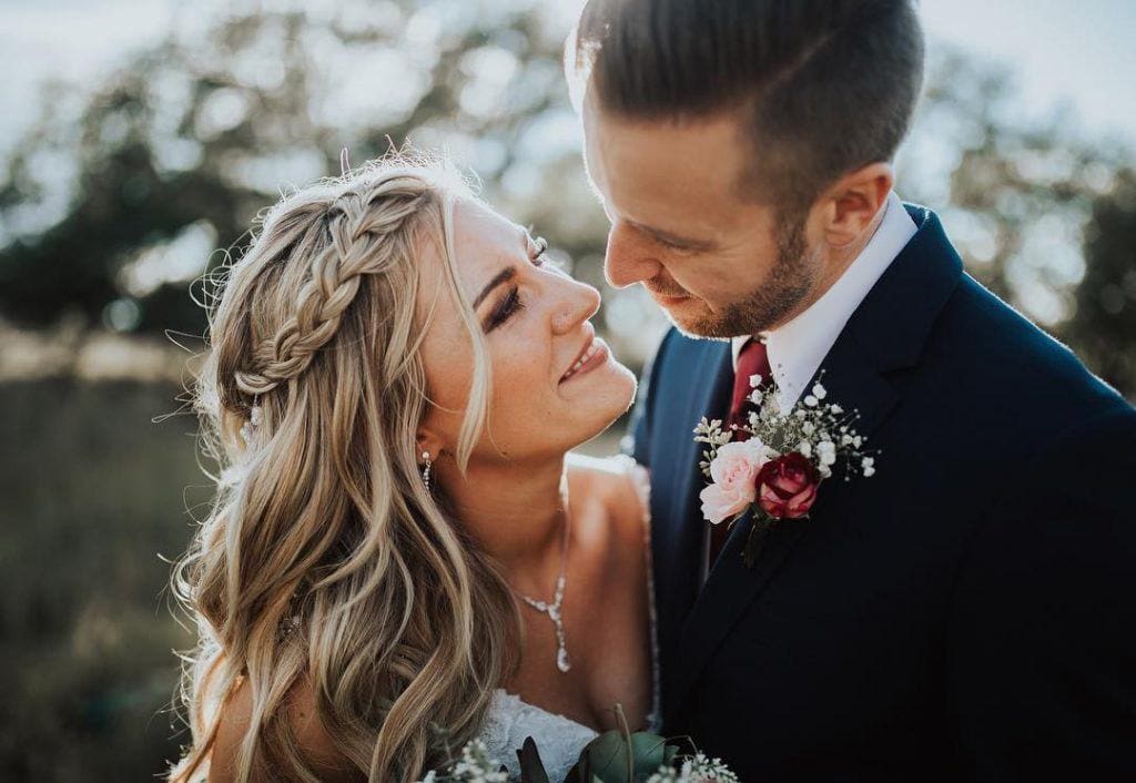 Michelle and Dr. Ryan smiling at their wedding