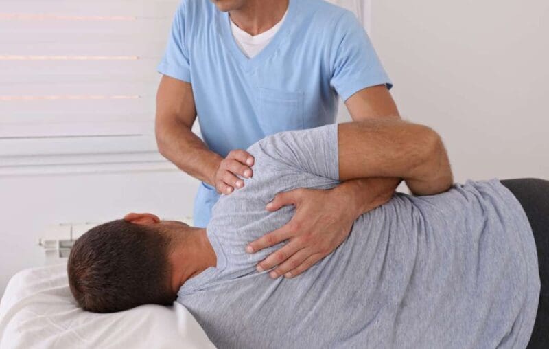 A Chiropractor Doing Chiropractic Adjustments