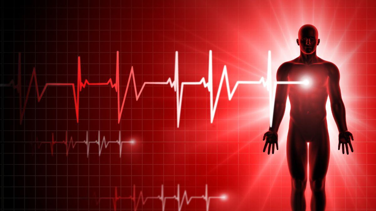 Person Standing In Front Of A Heartbeat Line
