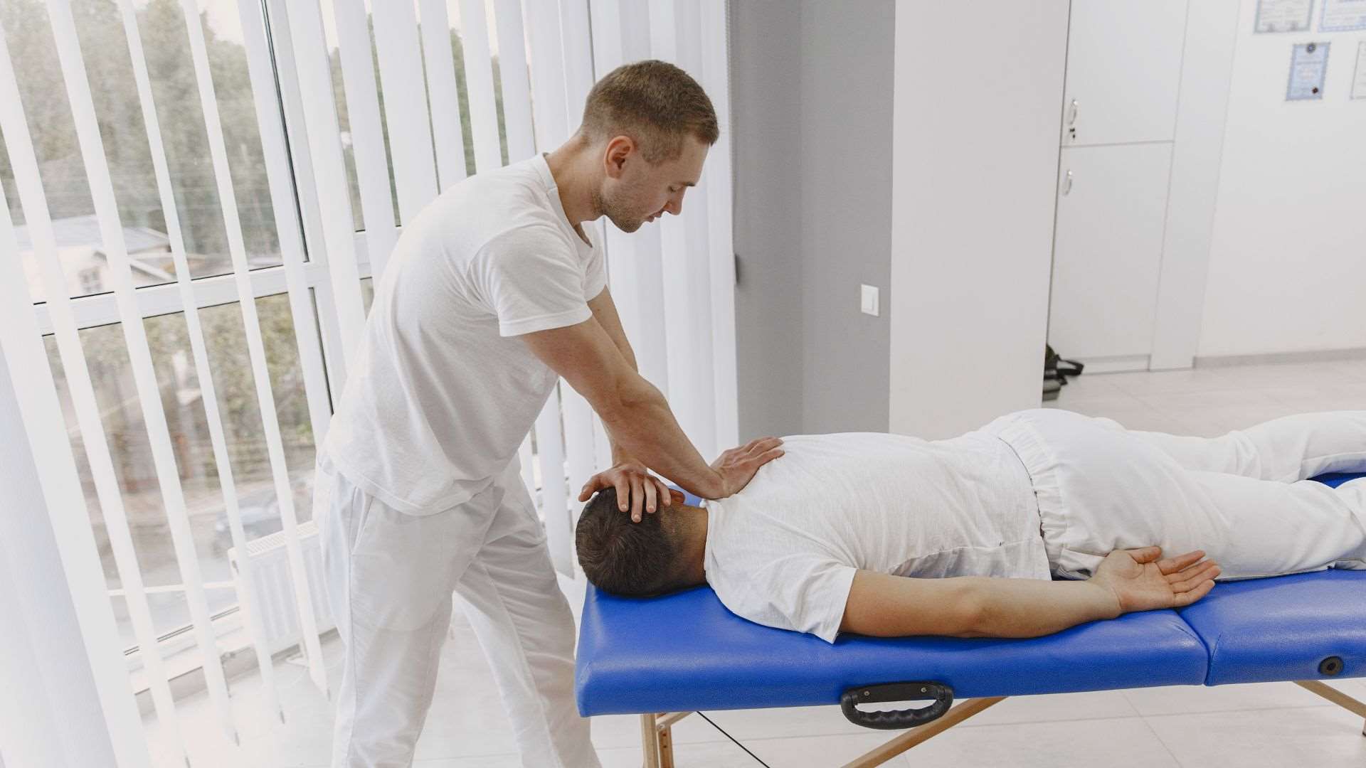 Chiropractor Providing Spine Adjustment