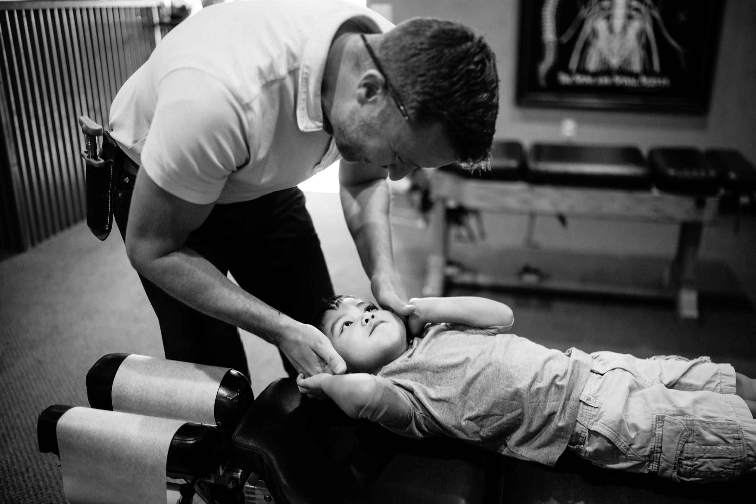 Chiropractor-giving-child-adjustment