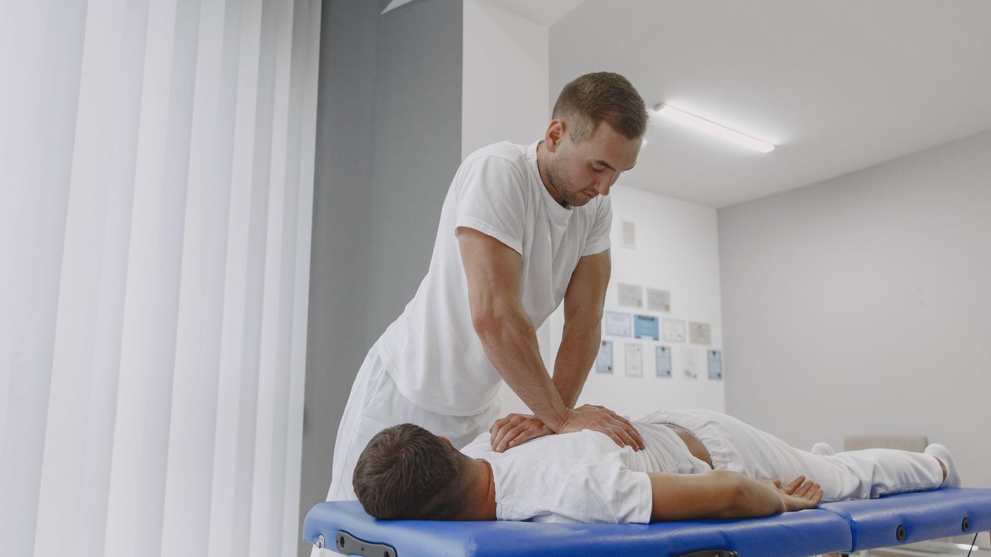 Chiropractor Performing Spinal Adjustment