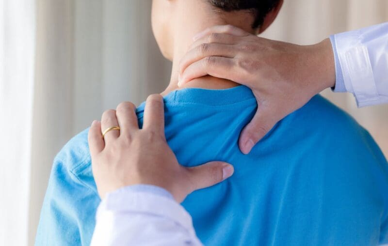 Chiropractor Performing Neck Adjustment