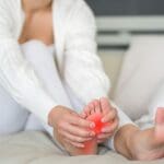 Woman With Plantar Fasciitis Pain