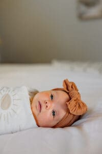 A newborn baby headshot. Taken in Colorado Springs, CO. To promote prenatal chiropractor, Dr. Betz at Radix Chiropractic.